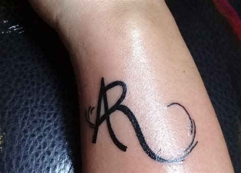 r word tattoo designs